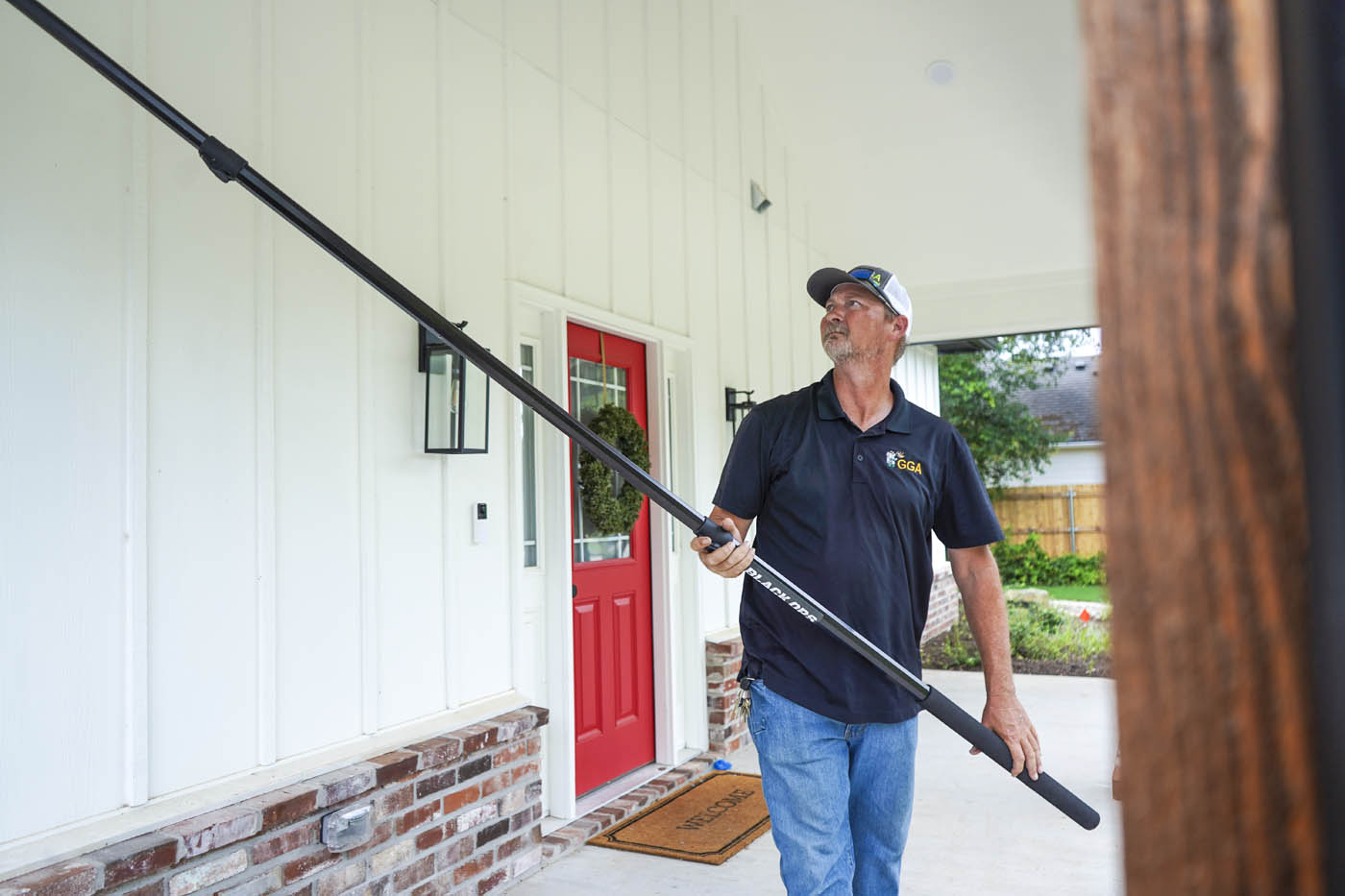 A GGA Pest Management technician working on a condominium residential pest control in Temple, TX.